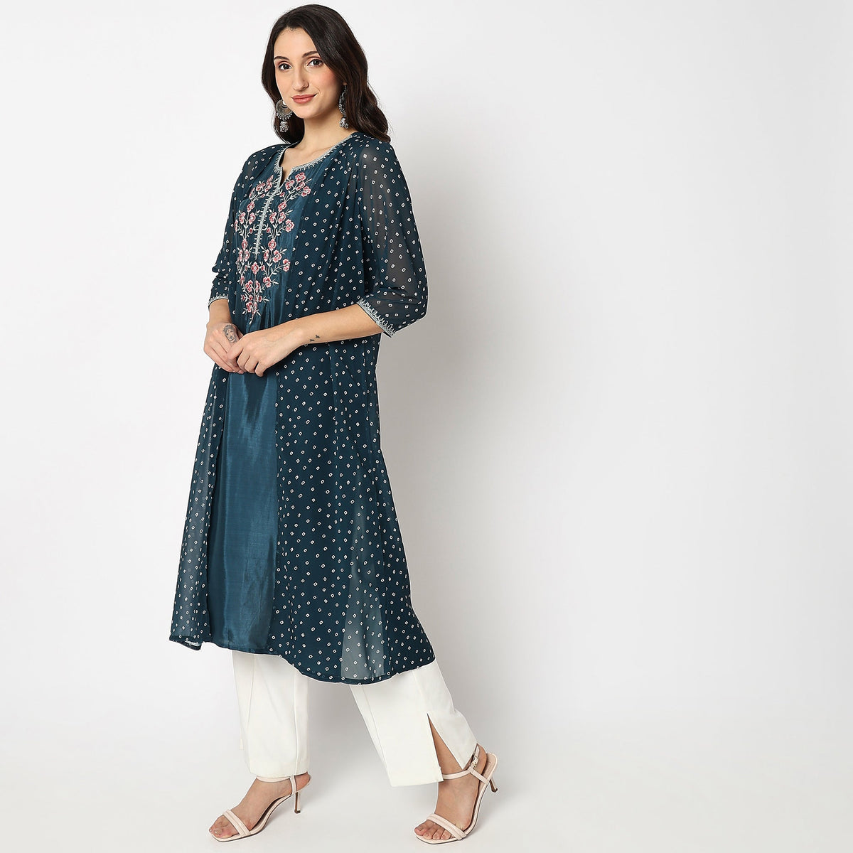 Women Wearing Flare Fit Embroidered Kurta