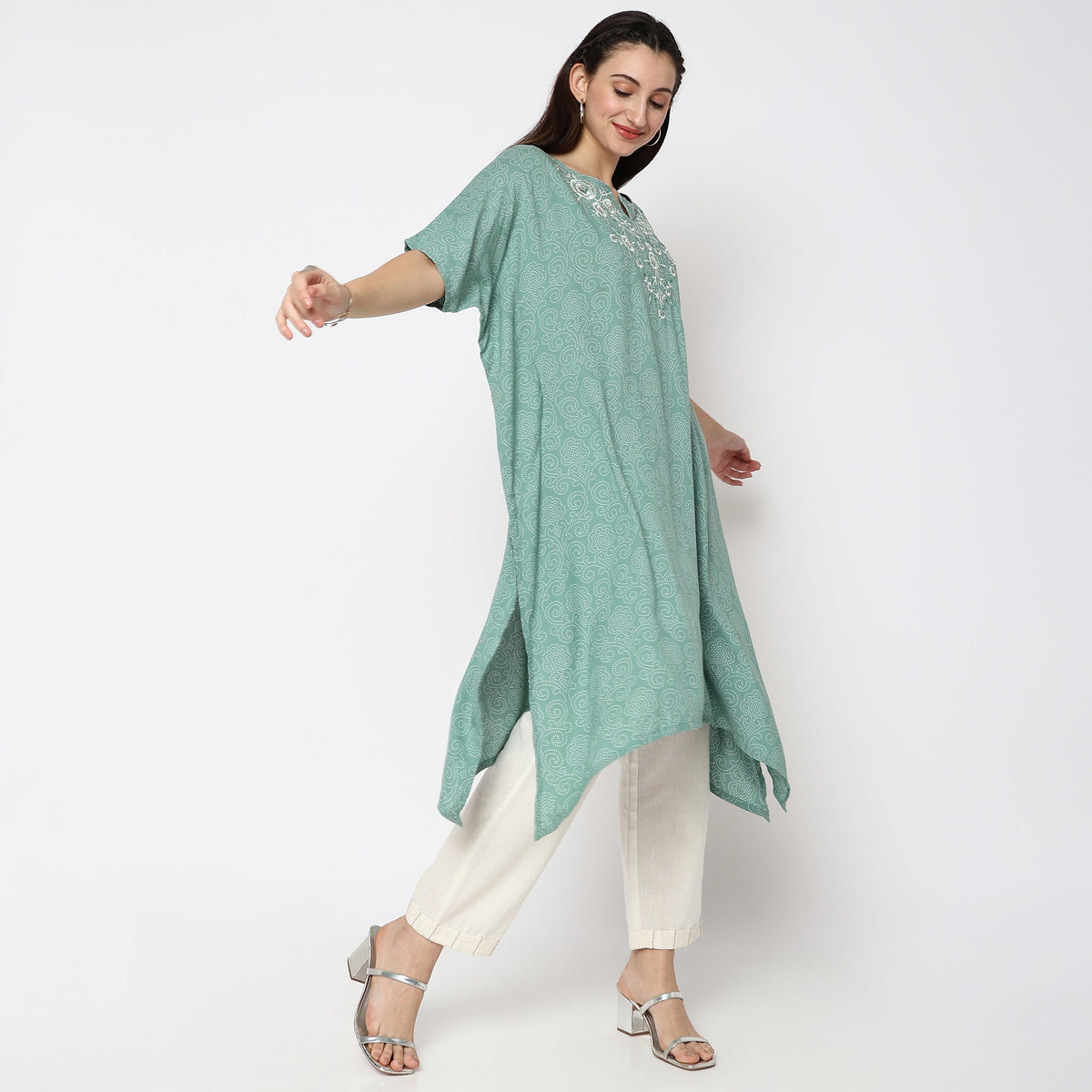 Women Wearing Flare Fit Embroidered Kurta