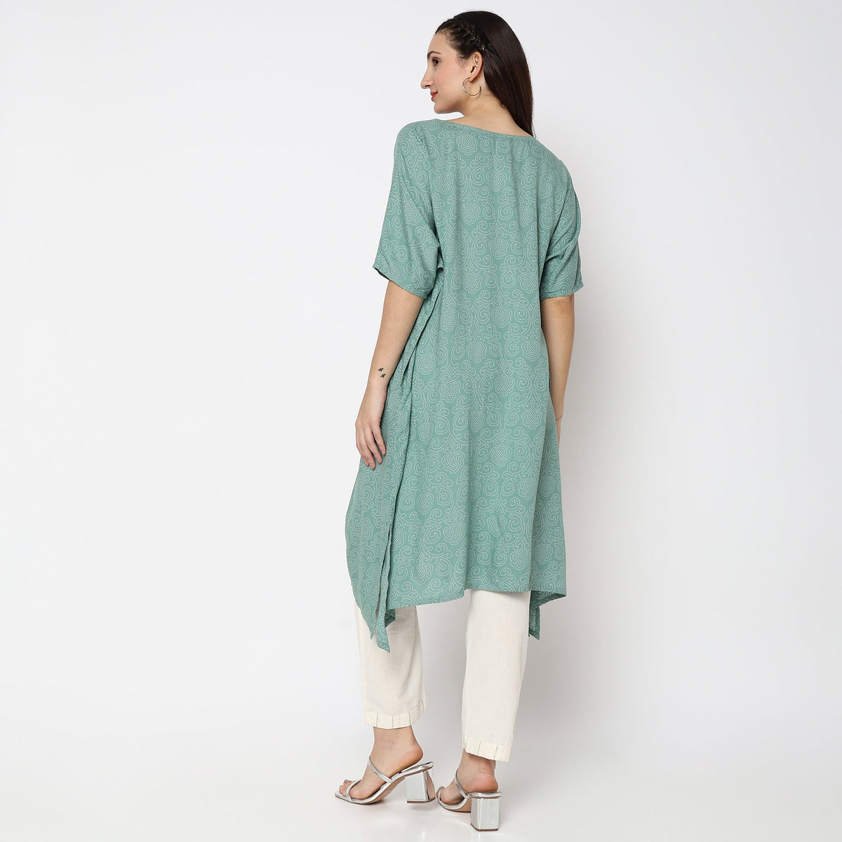 Women Wearing Flare Fit Embroidered Kurta