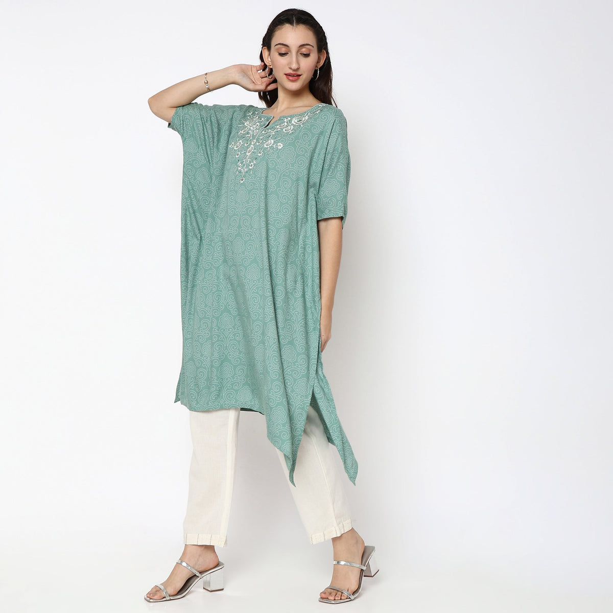 Women Wearing Flare Fit Embroidered Kurta