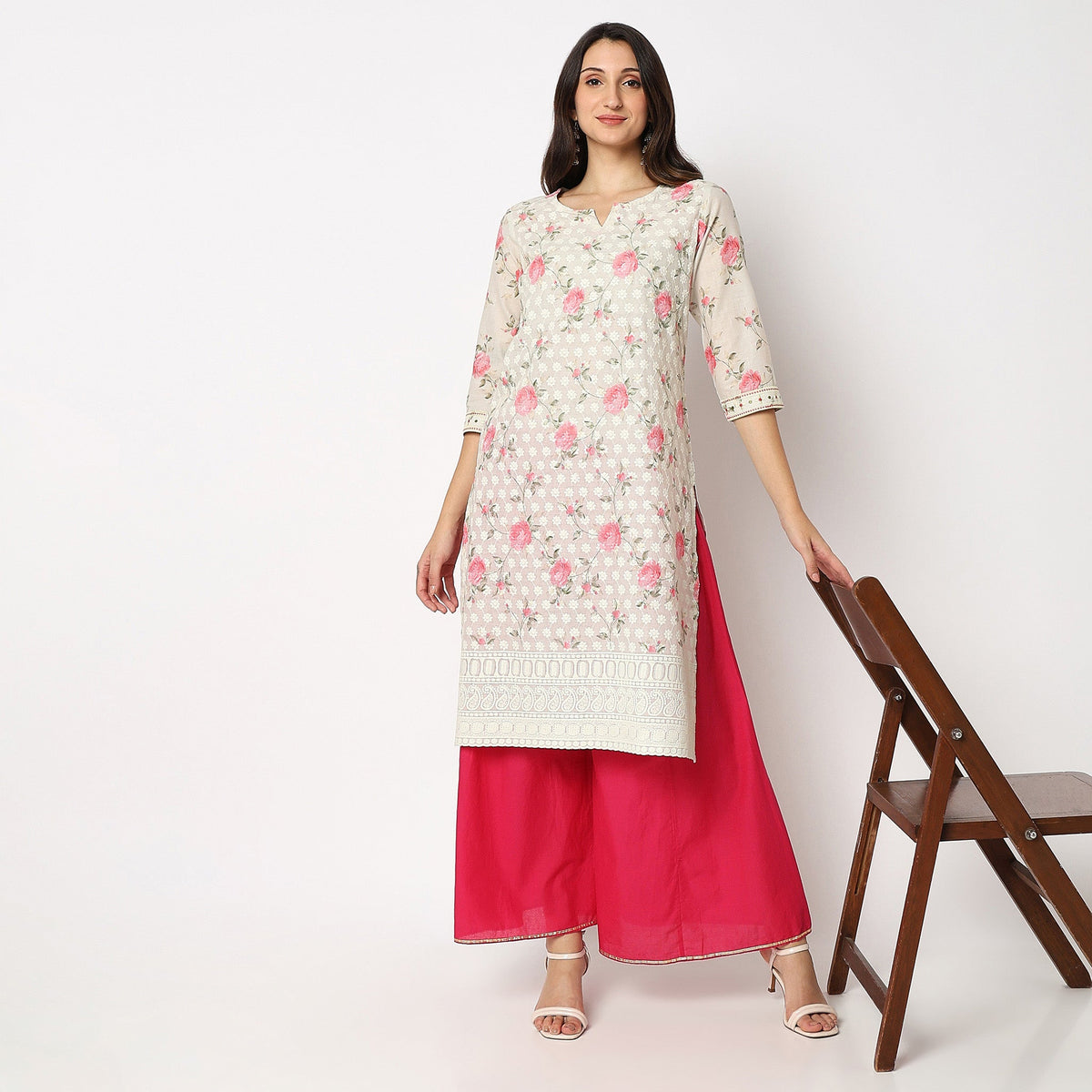 Women Wearing Straight Fit Printed Kurta