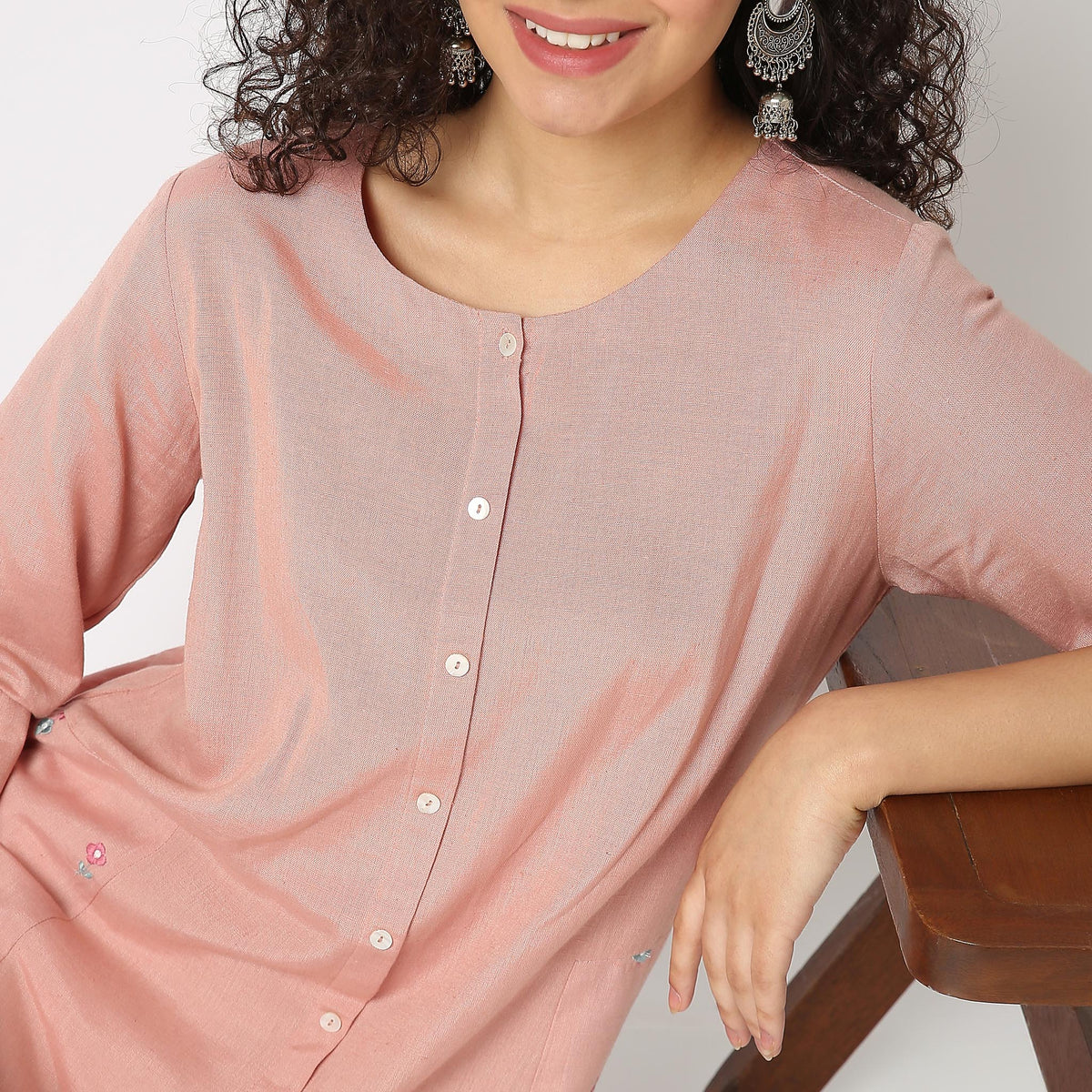 Women Wearing Regular Fit Solid Kurta